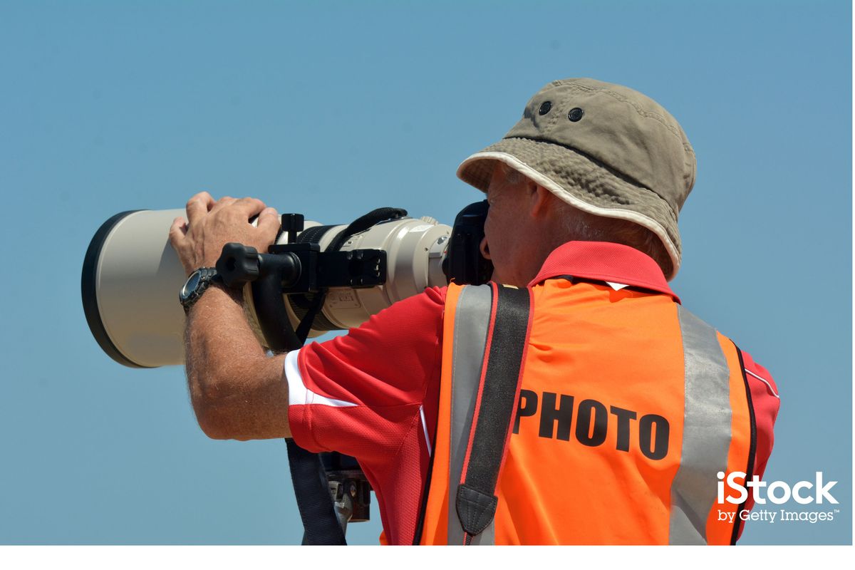 Sportfotograf, der an der Goldküste, Australien schießt. Foto von chameleonseye
