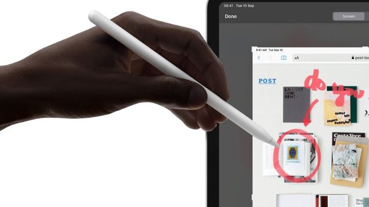 Hand mit Apple Pencil zum Zeichnen auf einem Computerbildschirm