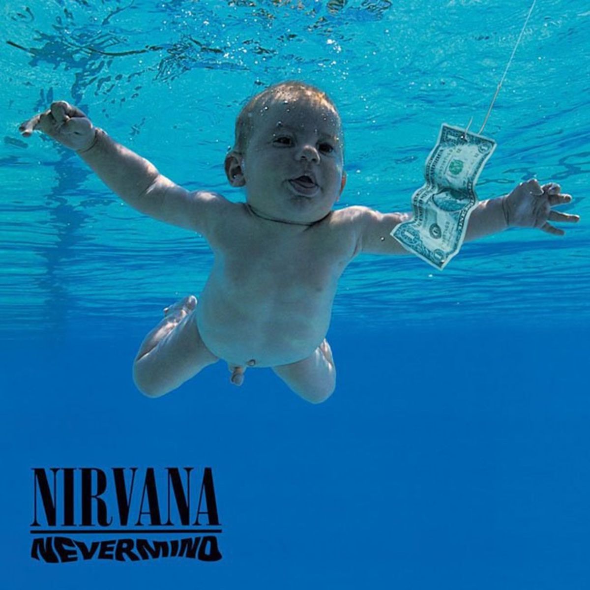 Nevermind cover viser en baby, der svømmer mod en dollarregning
