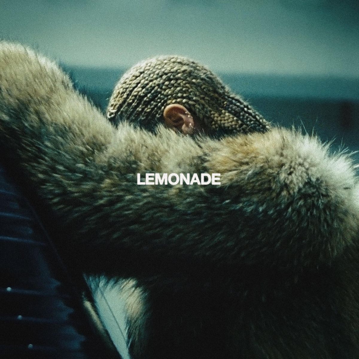 Limonadebetræk, der viser Beyonce bøjet og skjuler sit ansigt