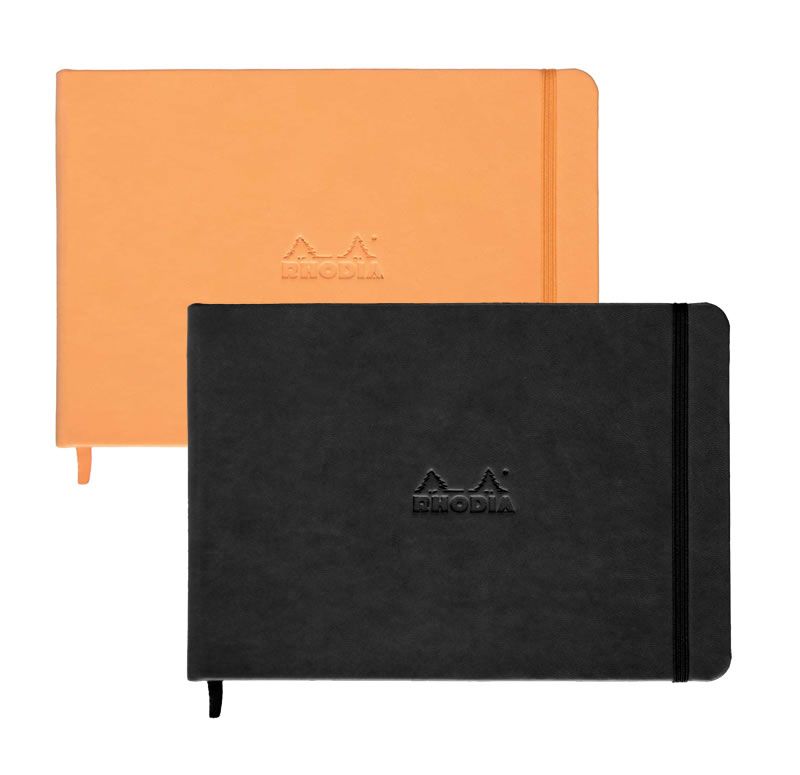 Un par de cuadernos Rhodia naranja y negro