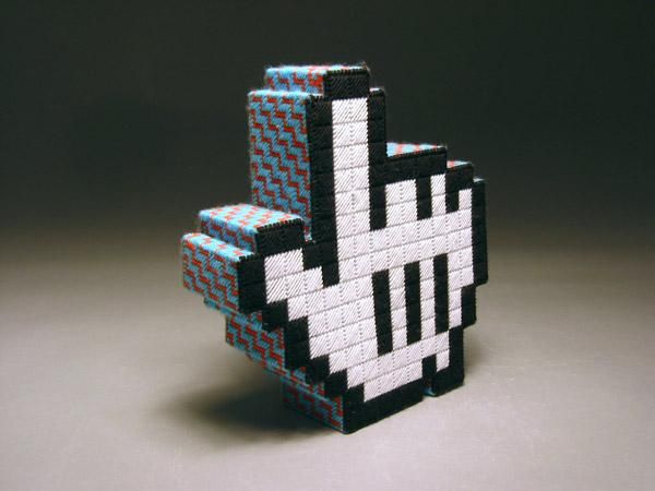Pixel art: main avec doigt pointé recréé en blocs
